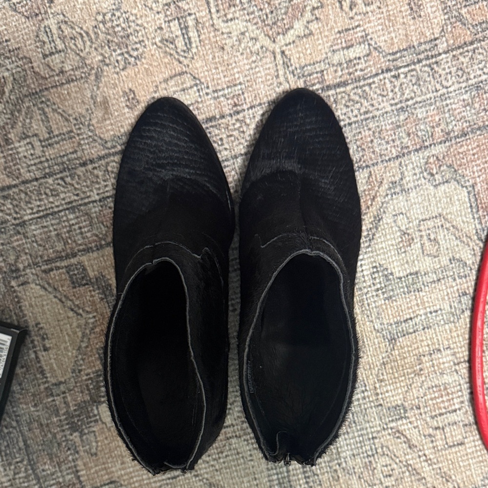 Black booties with back zipper